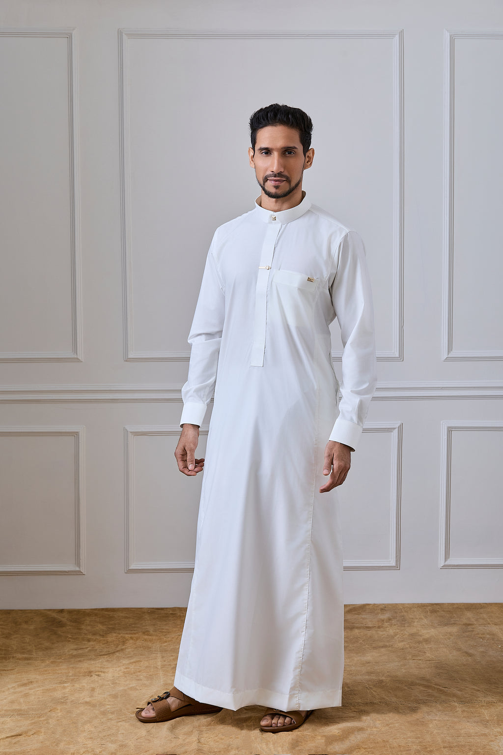 Cream Regal Thobe with Gold Crystal Buttons & Printed Detailing | AN 2314